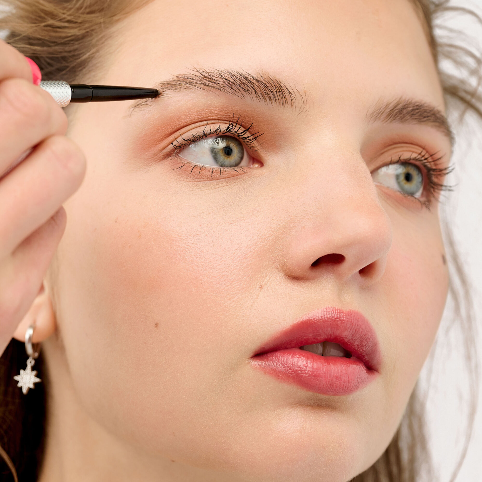 Apply Precisely, My Brow Pencil using light, short strokes.